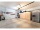 Spacious garage with built-in cabinets and ample storage at 10397 Station Creek Cir, Las Vegas, NV 89178