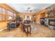 Spacious living room features a fireplace and tile floors at 10397 Station Creek Cir, Las Vegas, NV 89178