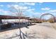 Exterior view of picnic and gathering area with a large covered pavilion and picnic tables at 10397 Station Creek Cir, Las Vegas, NV 89178