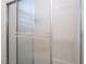 Bathroom with shower stall and textured glass door at 10397 Station Creek Cir, Las Vegas, NV 89178