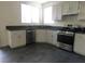 Kitchen with stainless steel appliances and dark counters at 11173 Hickory Glen St, Las Vegas, NV 89179