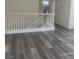 Upstairs landing with grey wood-look floors at 11173 Hickory Glen St, Las Vegas, NV 89179