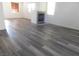 Bright living room featuring hardwood floors and fireplace at 11173 Hickory Glen St, Las Vegas, NV 89179