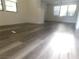 Spacious living room with hardwood floors and fireplace at 11173 Hickory Glen St, Las Vegas, NV 89179