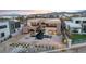 Modern home's backyard features a pool and landscaped patio at 1341 Villa Barolo Ave, Henderson, NV 89052