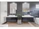 Modern bathroom with double sinks, a soaking tub, and a large shower at 1341 Villa Barolo Ave, Henderson, NV 89052
