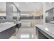 Spa-like bathroom with double sinks, a soaking tub, and a walk-in shower at 1341 Villa Barolo Ave, Henderson, NV 89052