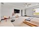 Spacious bedroom with platform bed and modern decor at 1341 Villa Barolo Ave, Henderson, NV 89052