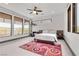 Comfortable bedroom with large windows and a modern platform bed at 1341 Villa Barolo Ave, Henderson, NV 89052