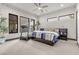 Spacious bedroom with a treadmill and large windows at 1341 Villa Barolo Ave, Henderson, NV 89052
