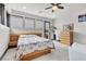 Bright bedroom featuring a wooden platform bed and plenty of natural light at 1341 Villa Barolo Ave, Henderson, NV 89052