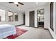 Modern bedroom with ensuite bathroom and large windows at 1341 Villa Barolo Ave, Henderson, NV 89052