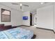 Serene bedroom with a wall-mounted TV and ample closet space at 1341 Villa Barolo Ave, Henderson, NV 89052