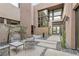 Private courtyard with seating and desert landscaping at 1341 Villa Barolo Ave, Henderson, NV 89052