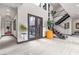 Elegant entryway with modern staircase and high ceilings at 1341 Villa Barolo Ave, Henderson, NV 89052