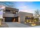 Luxury home with modern architecture and desert landscaping at 1341 Villa Barolo Ave, Henderson, NV 89052