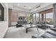 Gathering room with leather sofas and access to the backyard at 1341 Villa Barolo Ave, Henderson, NV 89052
