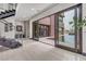 Modern interior with a stunning staircase and pool view at 1341 Villa Barolo Ave, Henderson, NV 89052