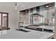 Sleek kitchen features stainless steel appliances and mosaic backsplash at 1341 Villa Barolo Ave, Henderson, NV 89052