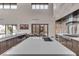 Modern kitchen with stainless steel appliances and large island at 1341 Villa Barolo Ave, Henderson, NV 89052