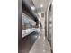 Modern kitchen with white countertops and dark brown cabinets at 1341 Villa Barolo Ave, Henderson, NV 89052