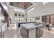 Open concept kitchen with large island and stainless steel appliances at 1341 Villa Barolo Ave, Henderson, NV 89052