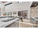 Bright kitchen boasts modern cabinetry and views to backyard at 1341 Villa Barolo Ave, Henderson, NV 89052