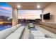Covered patio overlooking pool and sunset at 1341 Villa Barolo Ave, Henderson, NV 89052