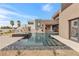 Modern pool and spa with desert landscaping at 1341 Villa Barolo Ave, Henderson, NV 89052