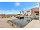 Modern pool with spa and fire feature at 1341 Villa Barolo Ave, Henderson, NV 89052