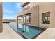 Modern pool with sleek design and desert landscaping at 1341 Villa Barolo Ave, Henderson, NV 89052