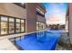 Luxury pool with view of kitchen at 1341 Villa Barolo Ave, Henderson, NV 89052