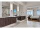 Elegant bathroom with marble flooring and double vanity at 1480 Macdonald Ranch Dr, Henderson, NV 89012