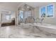 Bathroom with marble finishes and a walk-in shower at 1480 Macdonald Ranch Dr, Henderson, NV 89012