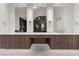 Modern bathroom featuring double sinks, marble floors and large mirrors at 1480 Macdonald Ranch Dr, Henderson, NV 89012