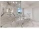 Spa-like bathroom with marble shower and soaking tub at 1480 Macdonald Ranch Dr, Henderson, NV 89012