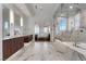 Luxury bathroom with marble finishes and a large shower at 1480 Macdonald Ranch Dr, Henderson, NV 89012