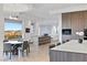 Modern dining room with large window and city views at 1480 Macdonald Ranch Dr, Henderson, NV 89012