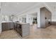 Modern kitchen with island and wine cooler at 1480 Macdonald Ranch Dr, Henderson, NV 89012
