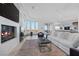 Spacious living room with fireplace and city views at 1480 Macdonald Ranch Dr, Henderson, NV 89012