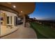 Outdoor entertaining area with a putting green and city views at 1480 Macdonald Ranch Dr, Henderson, NV 89012