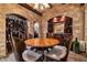 Spacious wine cellar with stone walls and tasting area at 1480 Macdonald Ranch Dr, Henderson, NV 89012