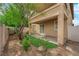 A second-story patio overlooks the serene backyard with artificial turf at 2033 Old Field Ave, North Las Vegas, NV 89081