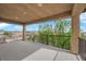 Covered balcony offers views of the surrounding neighborhood and blue skies at 2033 Old Field Ave, North Las Vegas, NV 89081