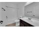 Bathroom featuring a shower and tub combination, vanity with dark cabinets, and tile flooring at 2033 Old Field Ave, North Las Vegas, NV 89081