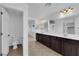 Bathroom featuring dual vanities, tiled floors, and separate toilet room for added privacy at 2033 Old Field Ave, North Las Vegas, NV 89081