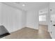 Bedroom with large window, neutral walls, and tiled floor at 2033 Old Field Ave, North Las Vegas, NV 89081