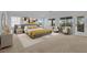 Spacious bedroom boasting natural light, stylish decor, and balcony access at 2033 Old Field Ave, North Las Vegas, NV 89081