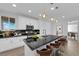 Bright kitchen featuring stainless steel appliances, and black countertops at 2033 Old Field Ave, North Las Vegas, NV 89081
