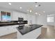 Bright kitchen featuring stainless steel appliances, and black countertops at 2033 Old Field Ave, North Las Vegas, NV 89081